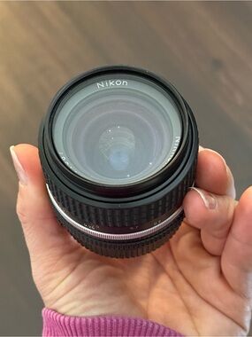 Nikon 28mm Black and Silver Manual Focus Camera Lens